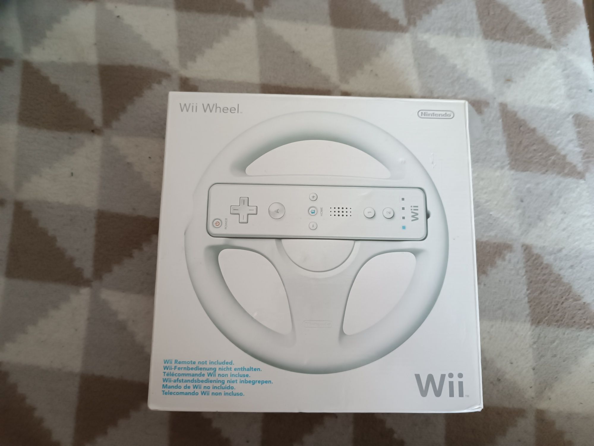 Wii Wheel w oryginalnym opakowaniu.
