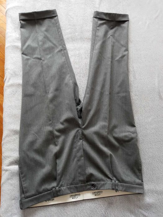 Sprzedam spodnie jasnoszare pas 120cm