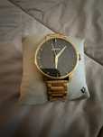 Relogio police dourado