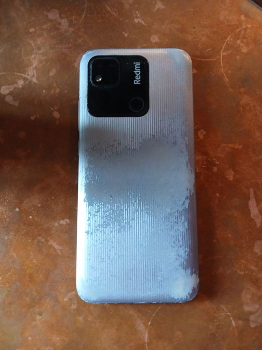 Redmi 10 A полностью рабочий, потёртости на задней крышке.
