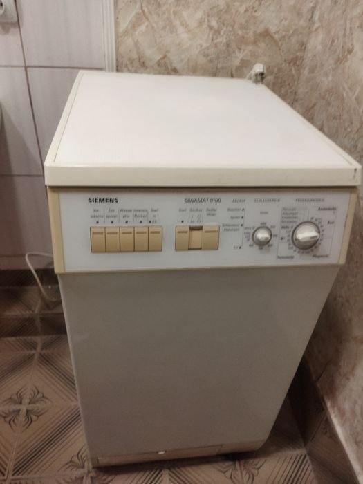 Пральна машина з верхнім завантаженням