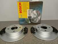 Opel Astra G/H 98- Tarcze hamulcowe tył /4 śruby/ + klocki kpl.>