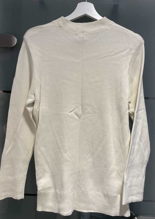 Kremowy sweter męski