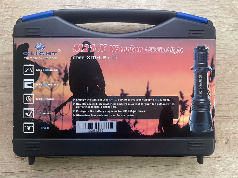 Latarka Olight M21-X Warrior + 2x akumulator 18650 oraz ładowarka
