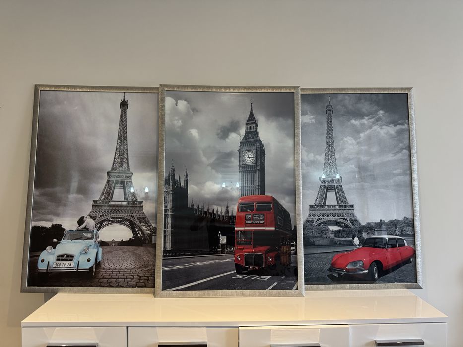 три картини в рамках за склом