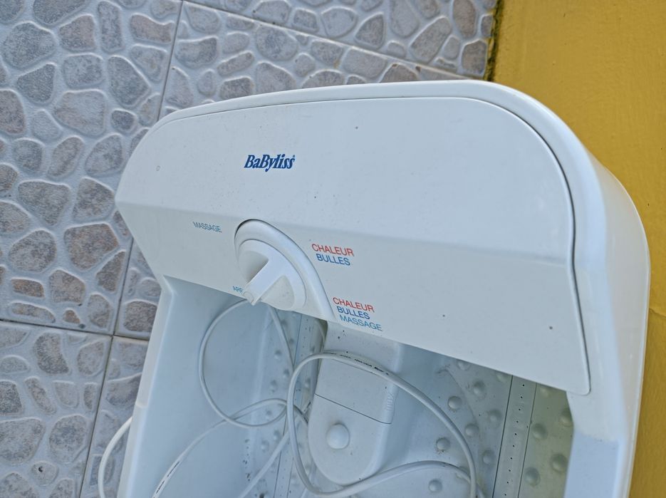 Massajador de pés impecável