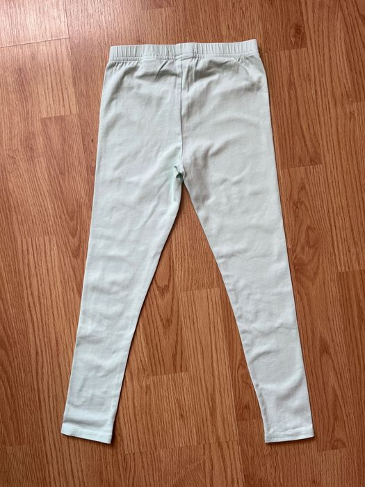 Nowe bez metki legginsy jasnomiętowe dla dziewczynki, roz 122, Sinsay