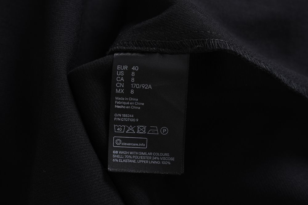 H&M elegancka czarna sukienka midi z kontrafałdami r. 40