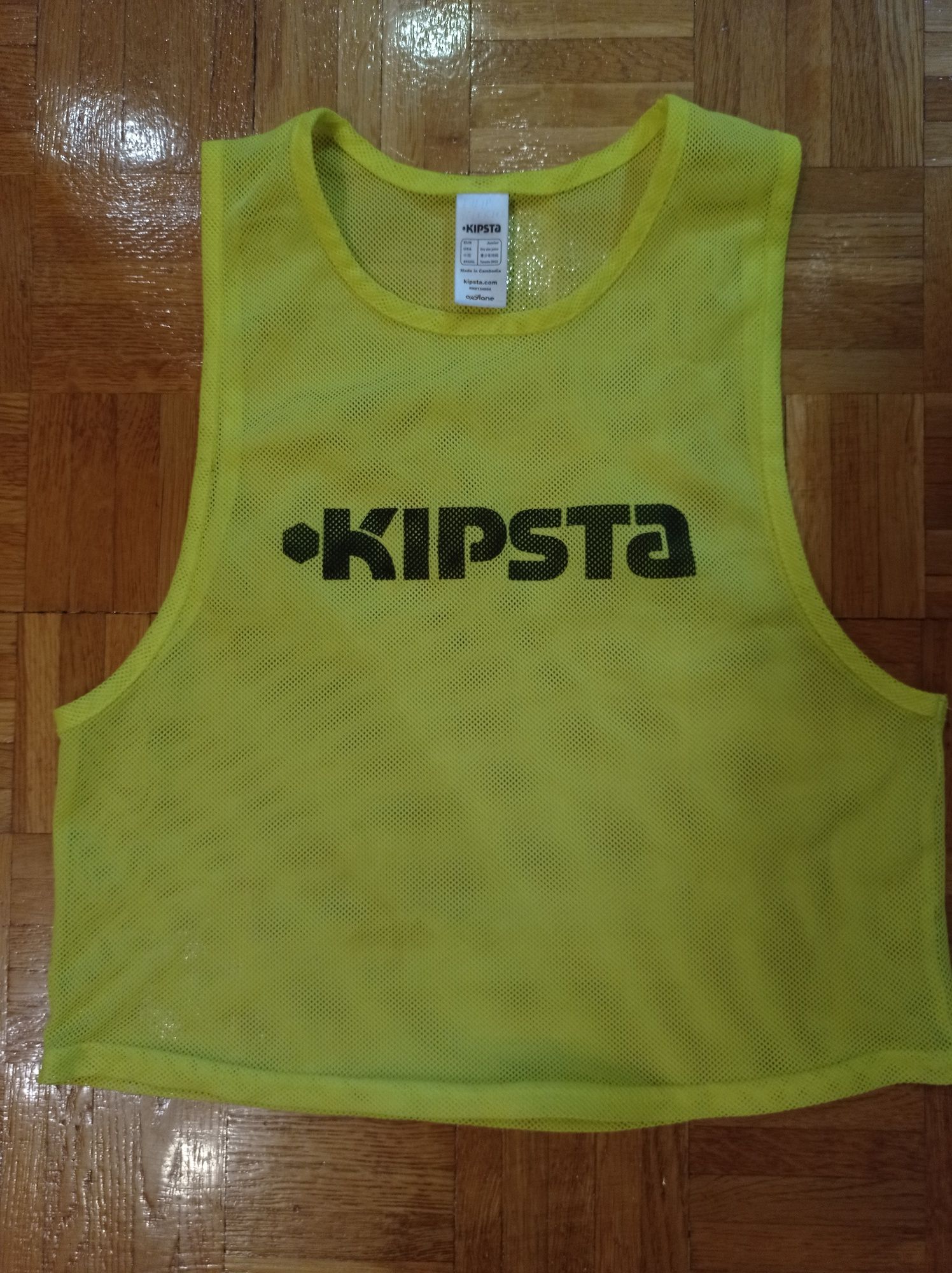 Narzutka piłkarska marki Kipsta One Size Junior