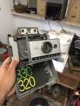 Máquina fotográfica Polaroid 320