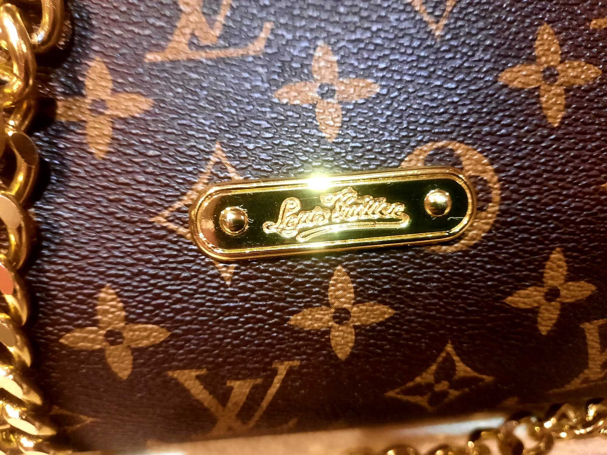 Louis Vuitton Paris  Eva Clutch