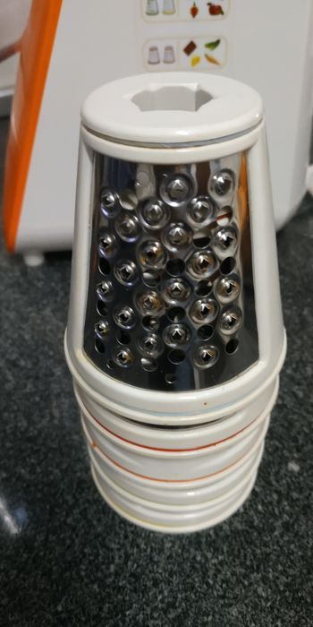 Máquina de ralar legumes