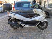 Honda PCX 125 de 2014, com 33609 km.