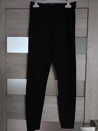 Nowe czarne legginsy damskie