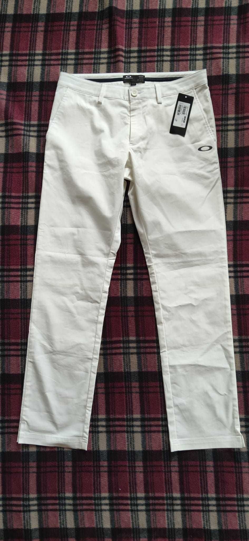 Sprzedam nowe spodnie męskie białe chinosy OAKLEY r. 30x32
