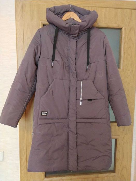 Тёплый пуховик, практически новый.