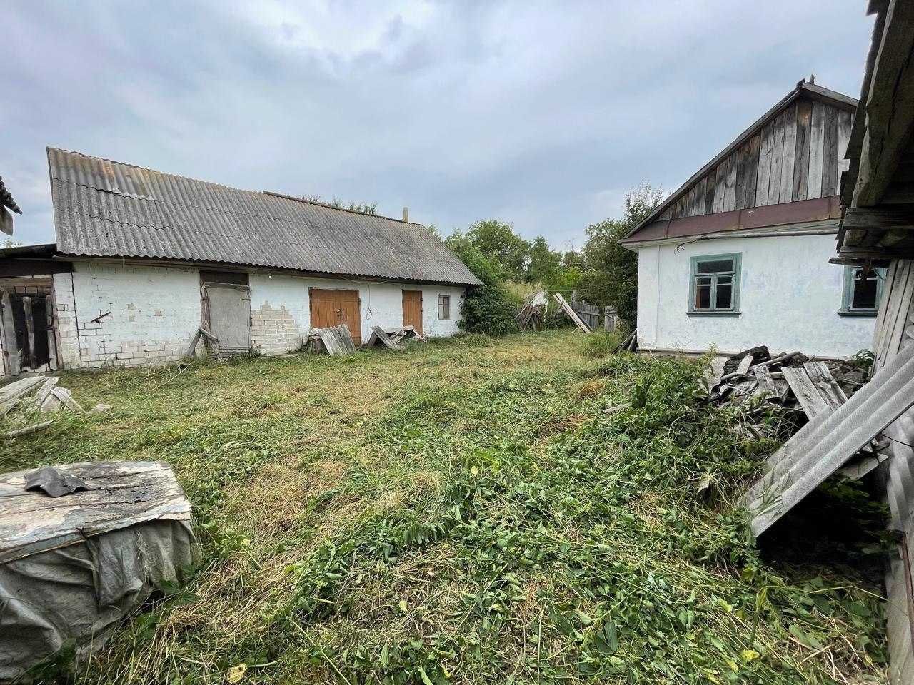 Продаж будинку  із земельною ділянкою.