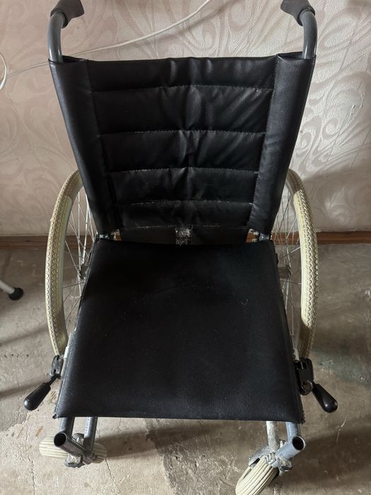 Инвалидное кресло