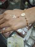 Terço pulseira ouro 19k nova