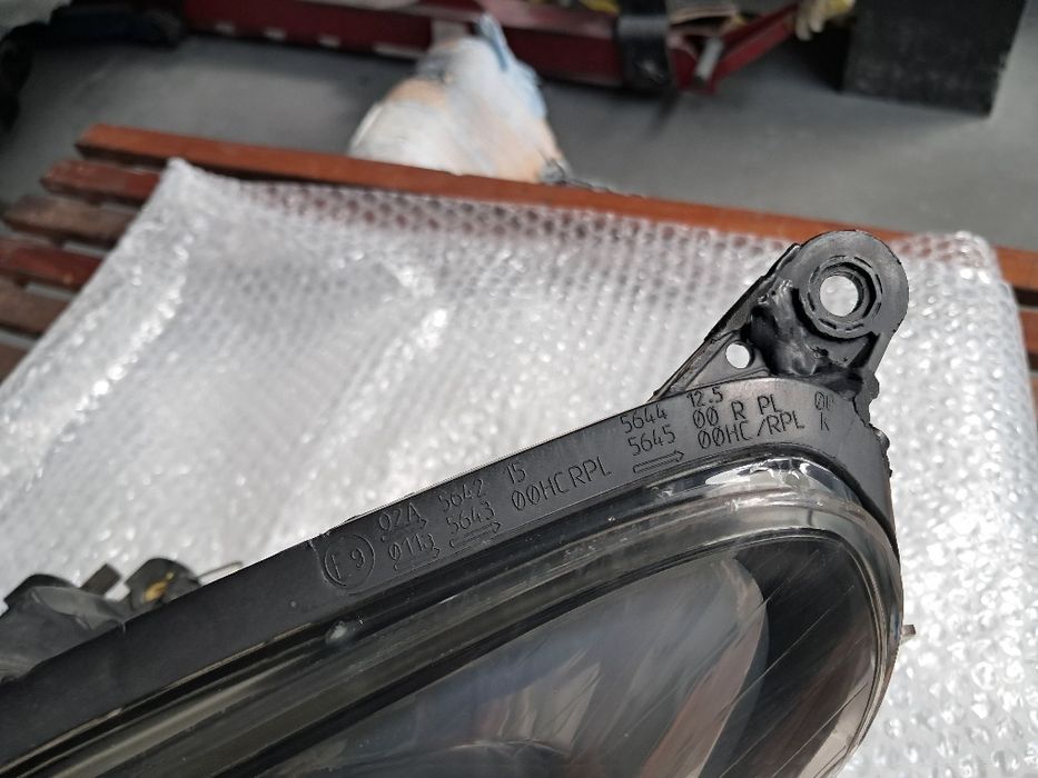 Farol esquerdo Opel Corsa D