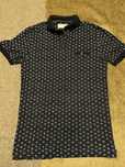 Polo azul marinho com cornucópias Primark tamanho XS