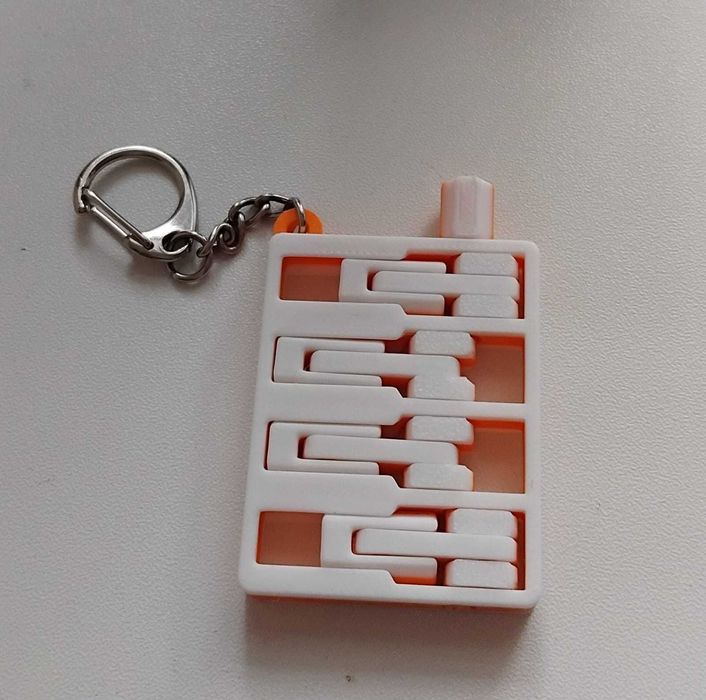 Рухливий брелок-антистрес “Міні-двигун”