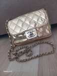 Chanel mała złota torebka do sukienki vintage