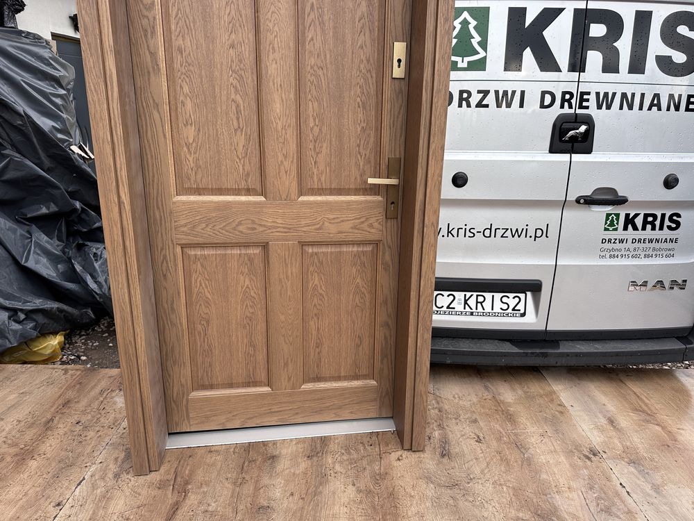 Drzwi zewnętrzne drewniane Dębowe Amerykańskie czyste powietrze Montaż