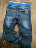 Spodnie jeans chłopięce Scooby-Doo smyk 116