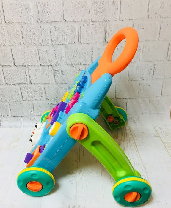 Ігровий центр 2 в 1 каталка ходунки столик