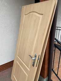 Drzwi wewnętrzne porta z klamką