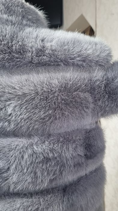 Норкрвая голубая жилетка