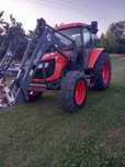 Kubota M 108 S z turem z łyżką i  widłami brutto