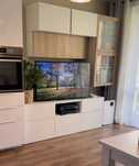 Zestaw mebli Besta Ikea UPPLEVA uchwyt na telewizor meblościanka