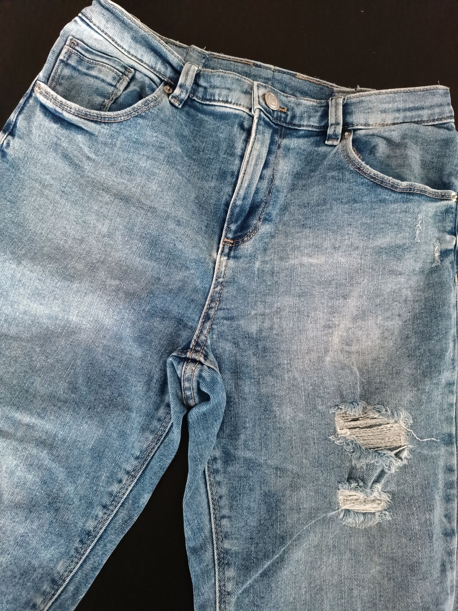 Spodnie damskie jeansy z przetarciami dziury Sinsay L