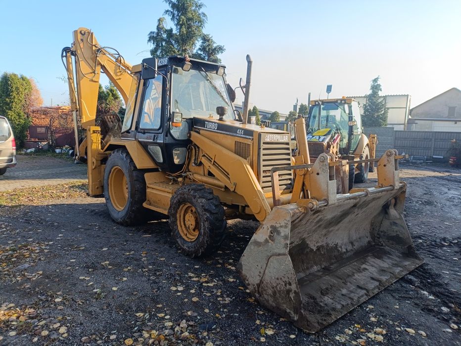 Cat 428 SKUP MASZYN Caterpillara 428 koparko ładowarka