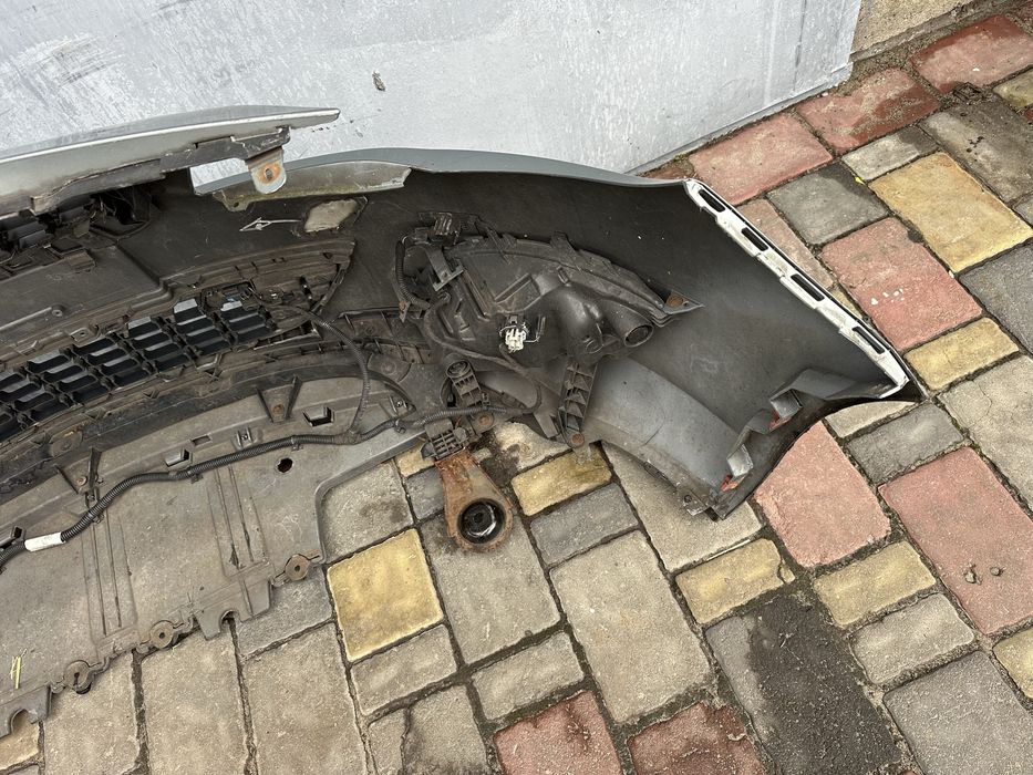 Бампер передний Opel Astra 2009-