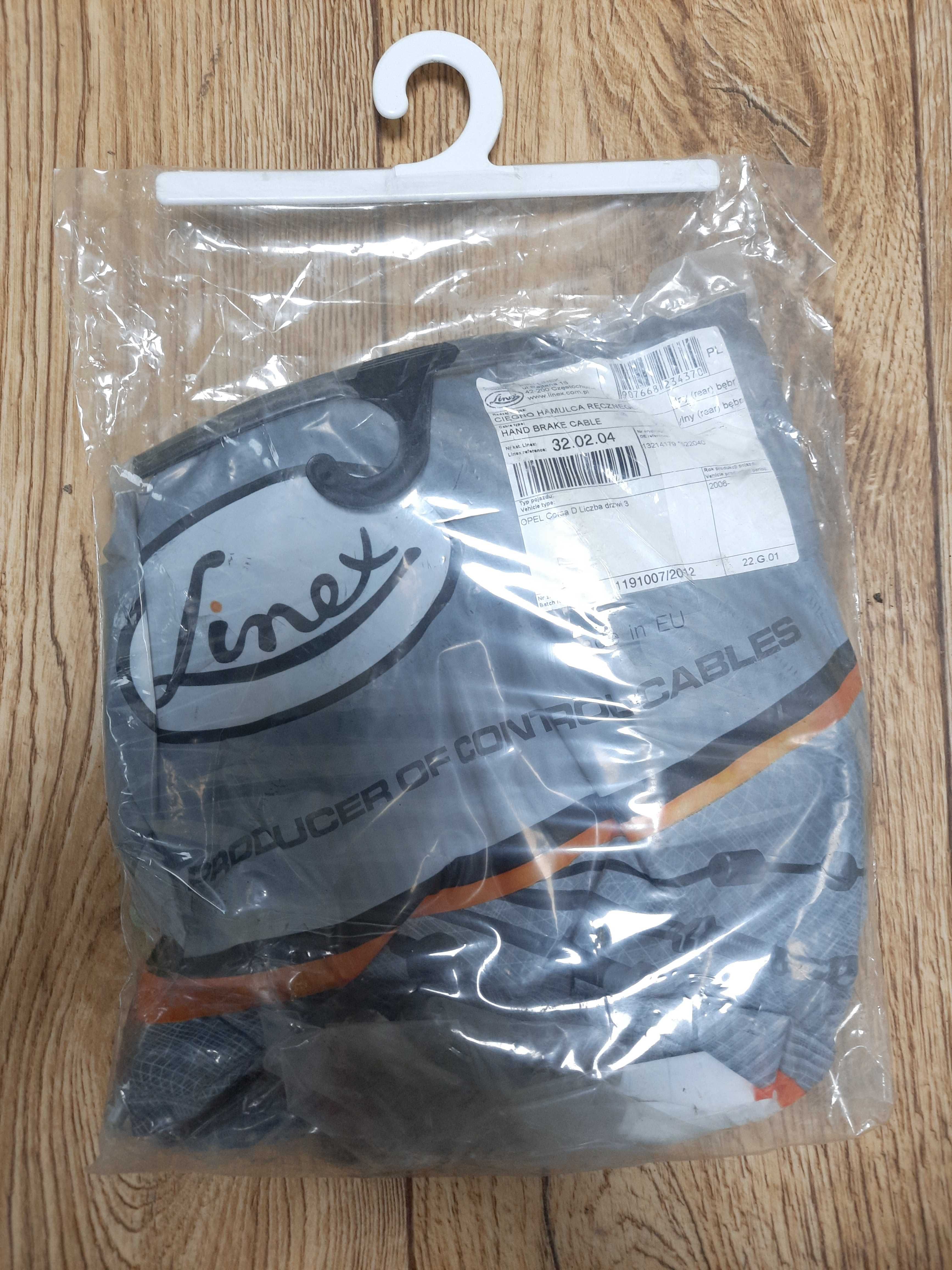 Linka hamulca ręcznego Opel Corsa D 522040