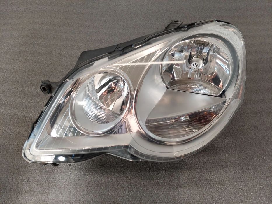Ótica / farol esquerda VOLKSWAGEN Polo (9N)