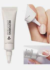 Krem do pielęgnacji skórek Nail Experts Avon
Restoring Cuticle Cream