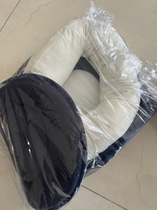 Позиціонер для сну новонародженого.