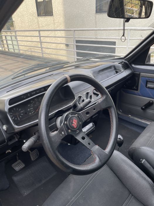 Peugeot 205 frente GTI