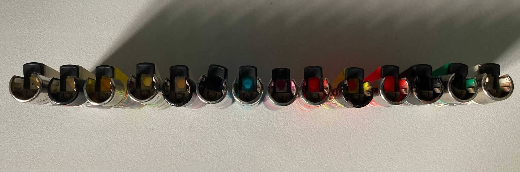 Conjunto de 14 Isqueiros Clipper Usados