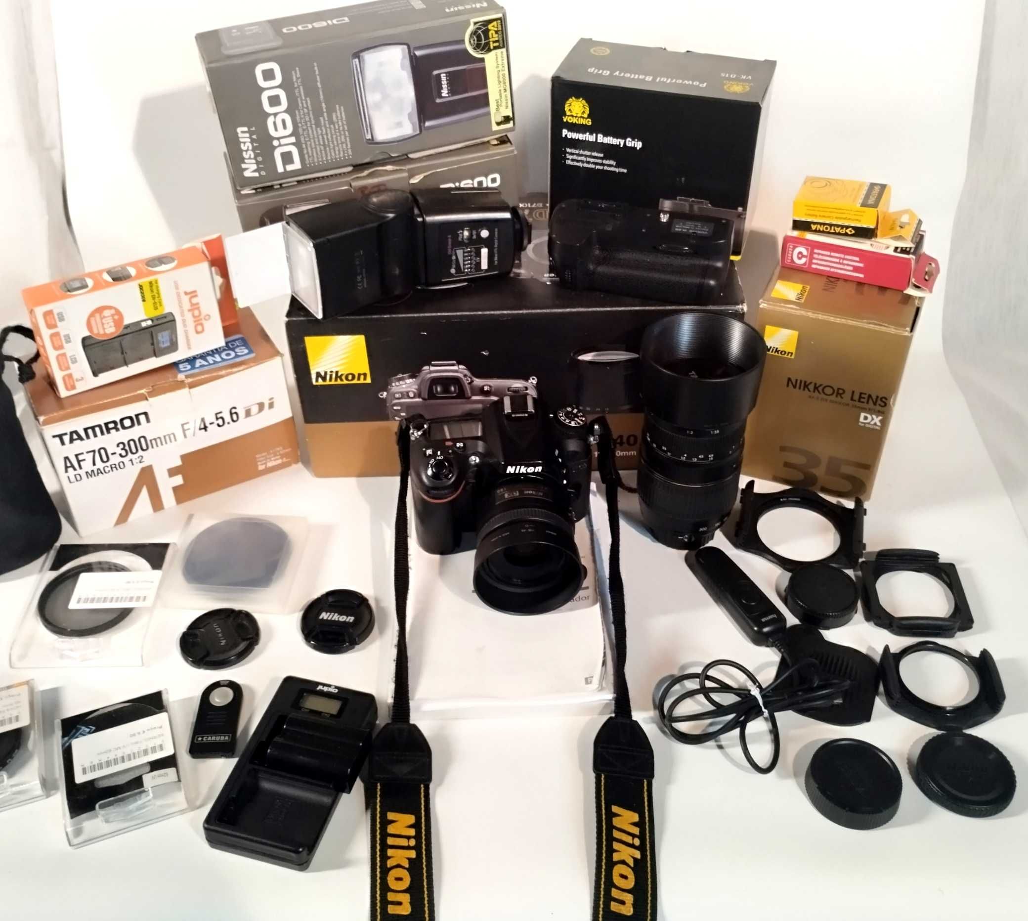 Máquina fotográfica reflex  Nikon D7100 objetivas e acessórios