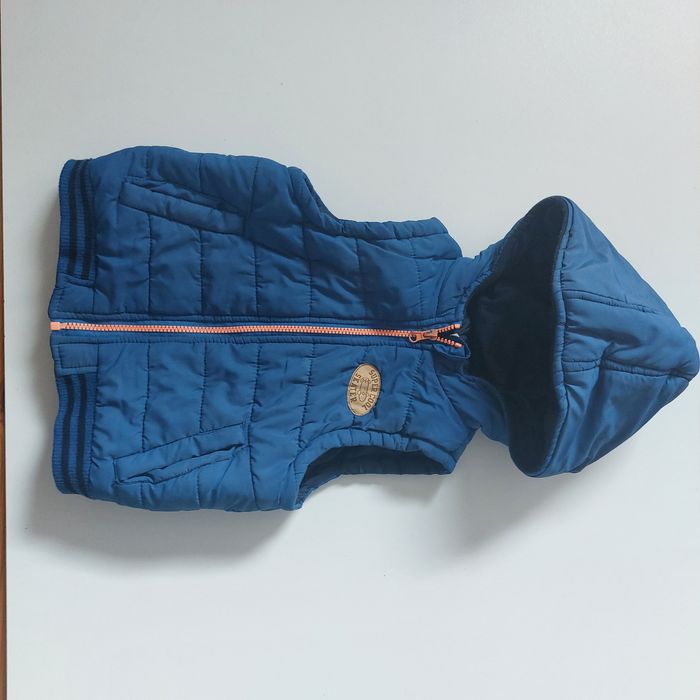 Ocieplany bezrękawnik kamizelka z kapturem Pepco 110