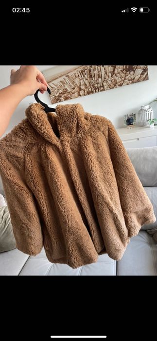 Casaco castanho pelo