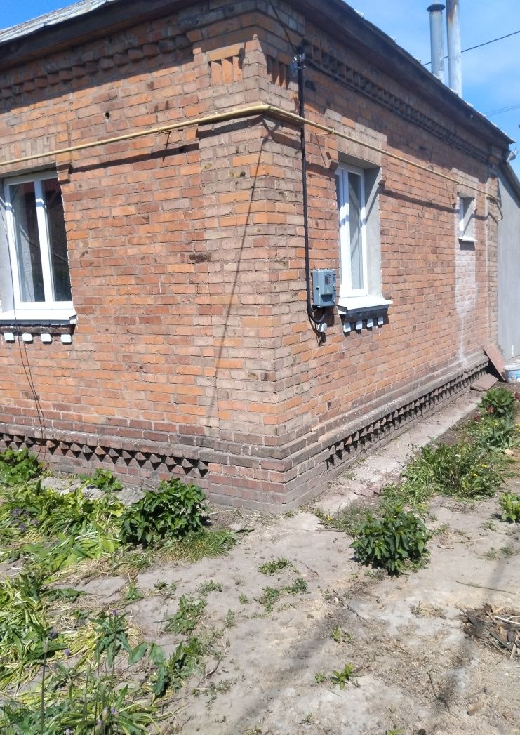 Продається пів будинку з окремими входами район Новолозовка м.Ромни.