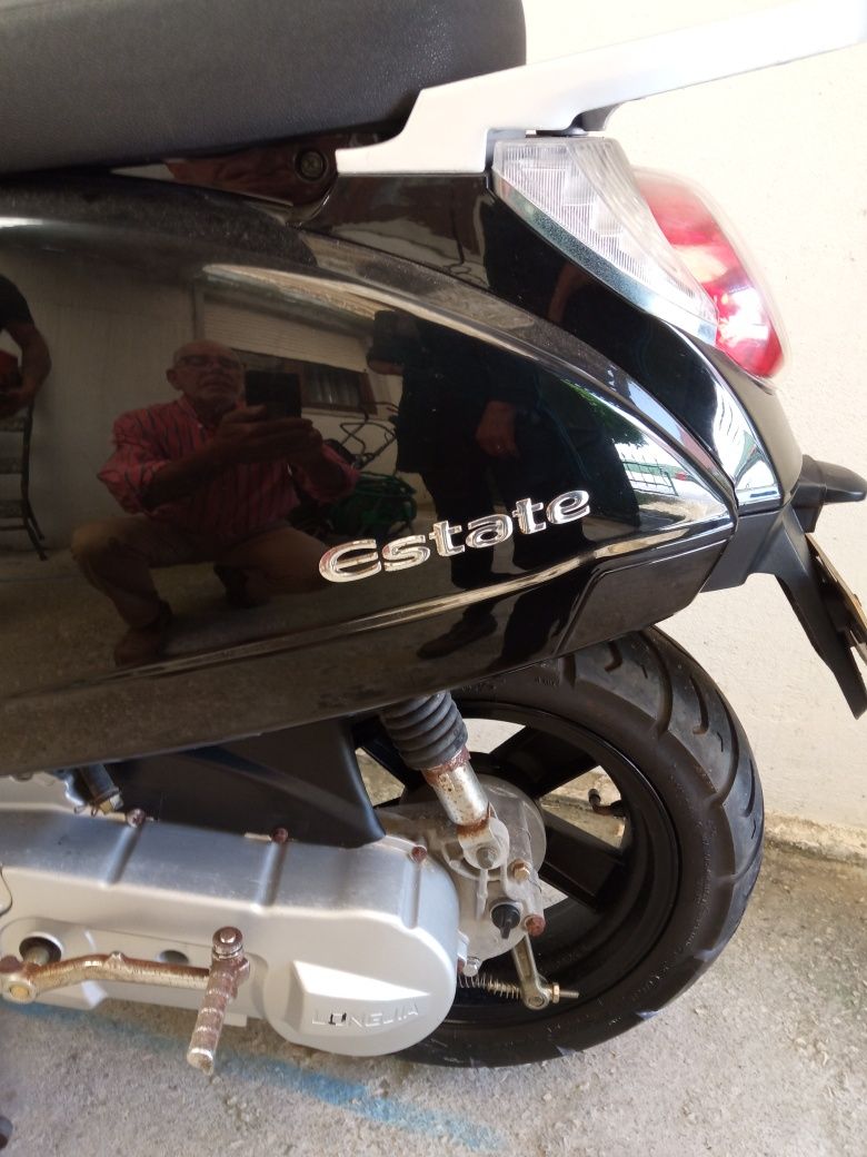 Mota a gasolina em bom estado
