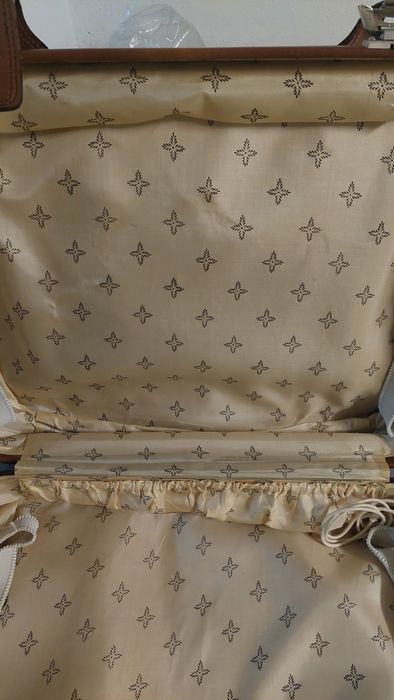 Mala de viagem de cor castanha