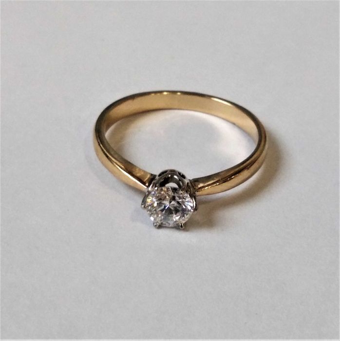 Złoty pierścionek 585 z brylantem 0,53ct (certyfikat )